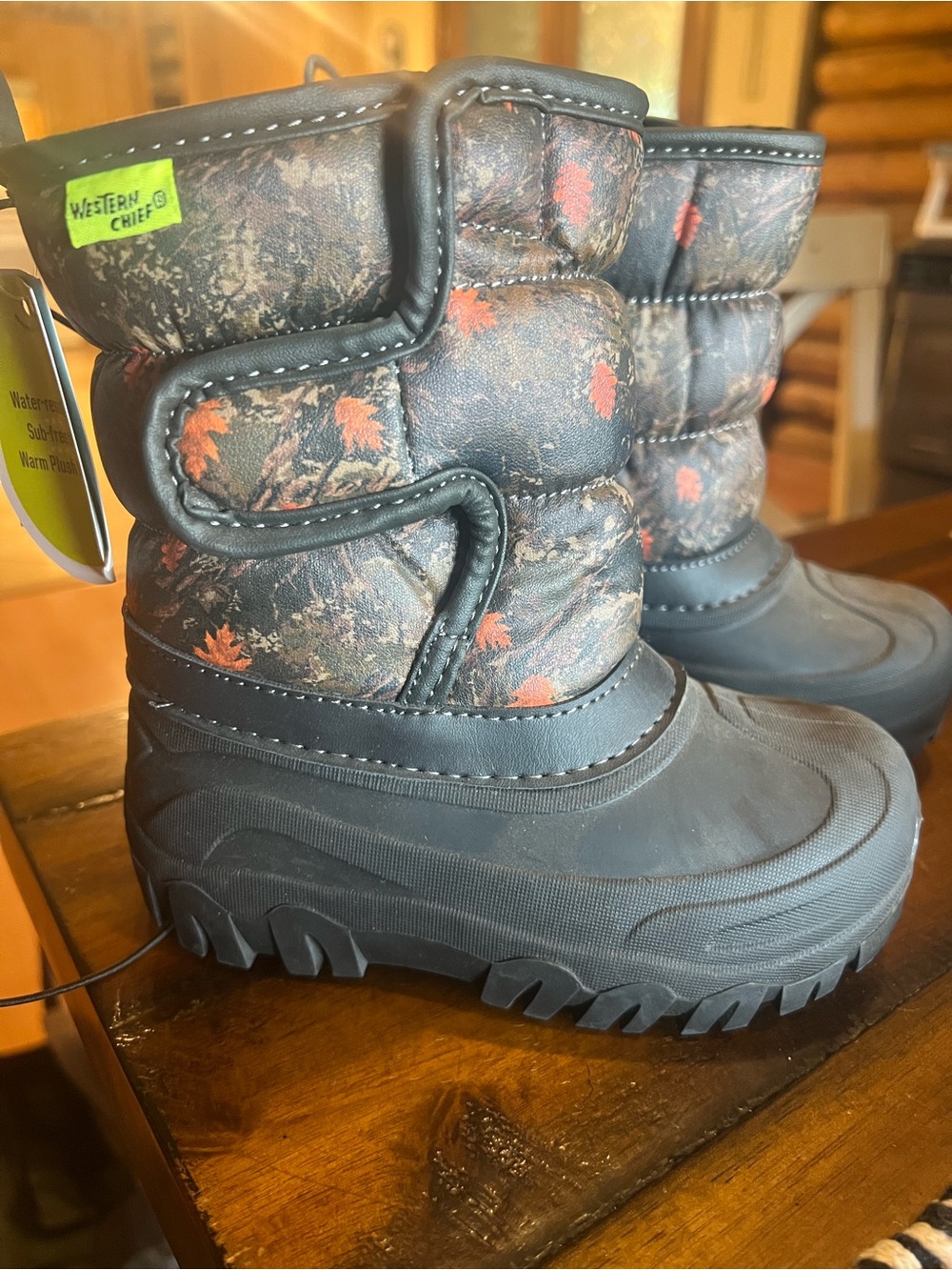 Western Chief Kids' Black and Orange Camo Winter Boots